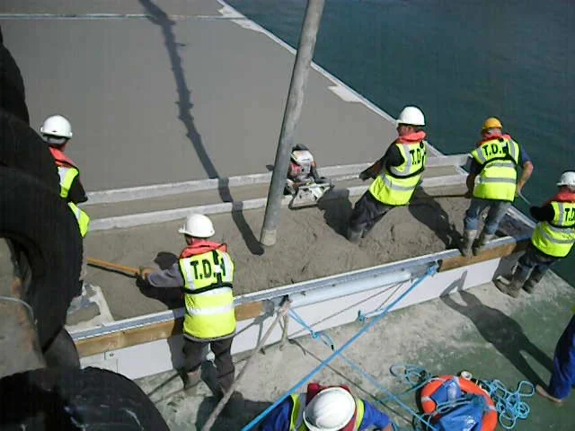 Pouring the concrete decks afloat. Offshore wind shore base, Lowestoft, UK